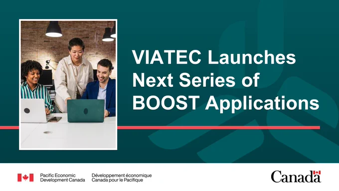 Three people are working on laptops. Text reads: VIATEC Launches Series of BOOST Applications.