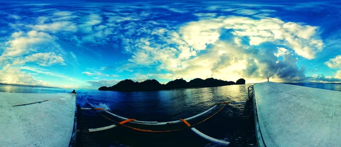 Catching that epic Bucas Grande sunrise from our little banca! The waves are calmer at sunrise. Captured in 360° panorama. 