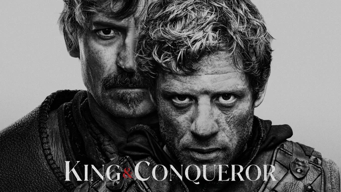 Key artwork for King & Conqueror featuring a black and white image of Nikolaj Coster-Waldau and James Norton. The title of the new drama is written at the bottom of the image. 