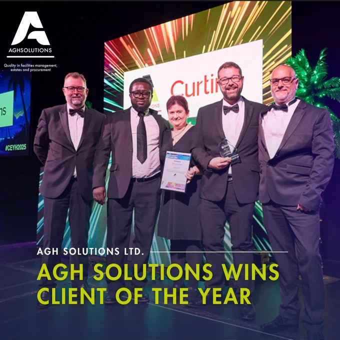 Members of the RAAC team collecting their award on stage.