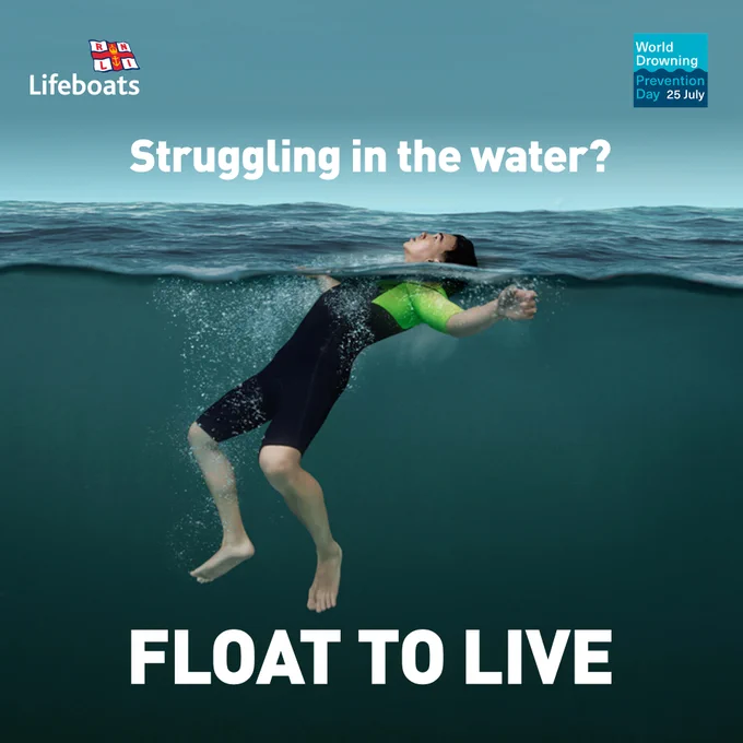 A person is floating on their back in water, with text reading 'Struggling in the water? FLOAT TO LIVE'. The RNLI and World Drowning Prevention Day logos are in each top corner. 