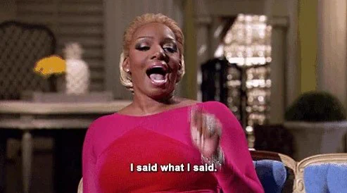 NeNe Leakes wearing a pink shirt saying, "I said what I said."