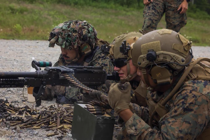 U.S. Marine Corps Cpl. Cesar Cisneros, front, Lance Cpl. James D. Cost, and Lance Cpl. Joshua B. Kauilavolk, all infantry machine gunners with Fox Company, 2d Battalion, 6th Marine Regiment, 2d Marine Division, provide supporting fire with an M240 Machine Gun during an air assault at Cutler, Maine, July 9, 2025. Atlantic Alliance 2025 (AA25) is the premier East Coast naval integration exercise, featuring over 25 U.S. Navy and Marine Corps units alongside Dutch naval forces and British Royal Commandos. Spanning from North Carolina to Maine, AA25 will showcase a range of dynamic events including force integration, air assault operations, bilateral reconnaissance, naval strait transits, amphibious assault training, and a simulated war-at-sea exercise. (U.S. Marine Corps photo by Lance Cpl. Alexandria Serrano)