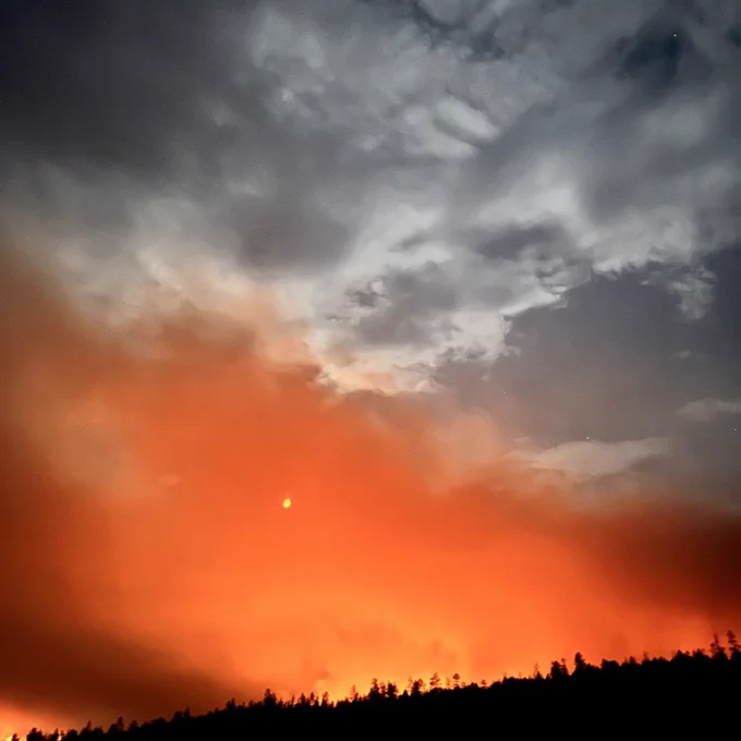 A view of the Middle Mesa fire near Caracas Canyon as night sets. 