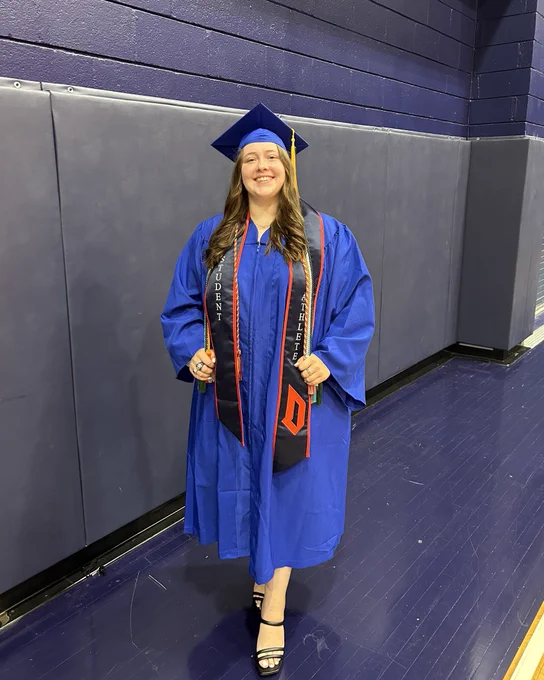 Morgan Brookover wearing graduation cap and gown