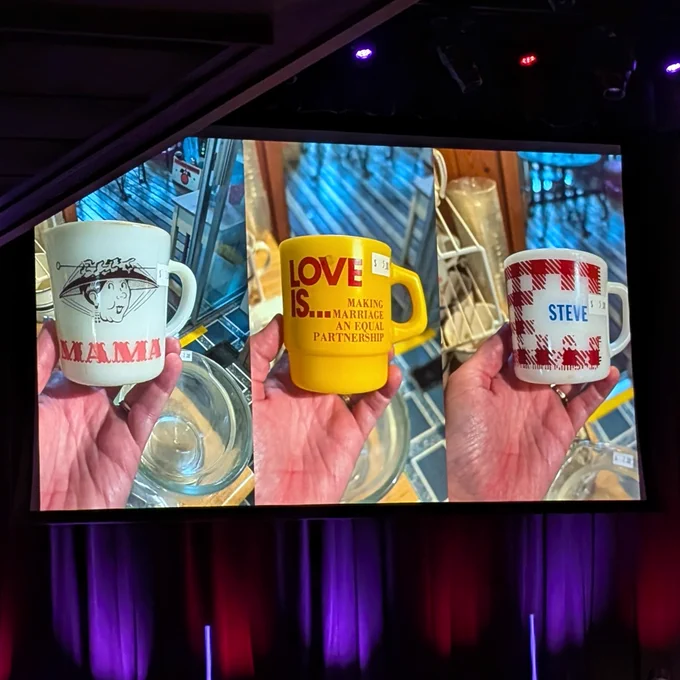 Conference presentation of three mugs on a slide: one says "Mama", one says "Love is...making marriage an equal partnership", and the third is a gingham print with the name "Steve". 