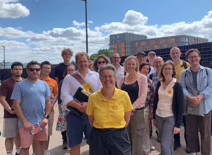 Big group of Lib dem campaigners in west hampstead including byelection candidate Janet Grauberg