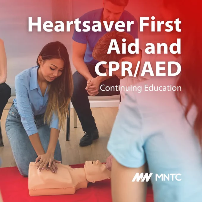 Participants practice CPR on a dummy during a Heartsaver First Aid and CPR/AED continuing education class hosted by MNTC.