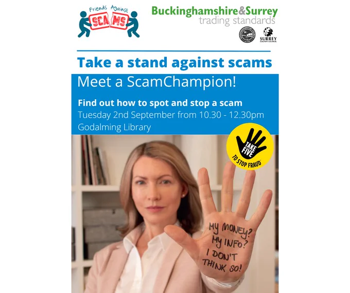 A photo of a woman holding up her palm against a white backdrop. The words 'My money? My info? I don't think so!' are written in sharpie on her hand. Above is a blue box with white text. 'Take a stand against scams. Meet a ScamChampion! Find out how to spot and stop a scam. Tuesday 2nd September from 10.30 - 12.30pm Godalming Library.' 

The Friends Against Scams, Buckinghamshire & Surrey trading standards, and Surrey County Council logos are at the top of the image. 