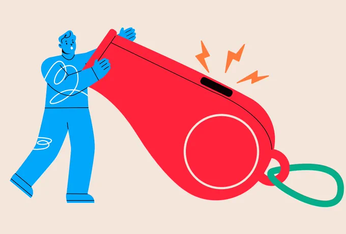 Man blowing a whistle 