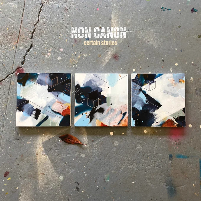 Album artwork for Non Canon - Certain Stories

The artwork shows three abstract square paintings on a concrete background. 