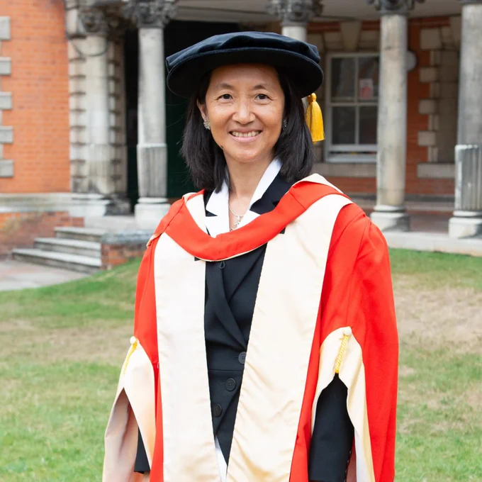Dr Shirlene Oh in graduation gown.