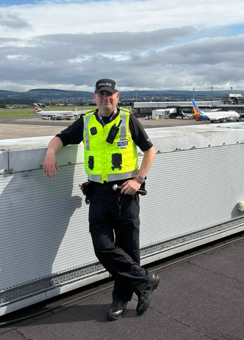 A uniformed police sergeant at Glasgow Airport
