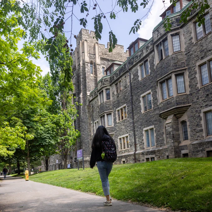 Student walking by Knox College