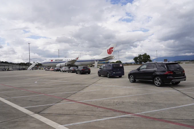 a group of cars parked in a parking lot