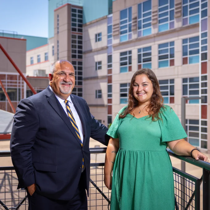 Superintendent Mark Laurrie and Megan Koury, project manager and trainer at ITTIC, outside Niagara Falls High School.