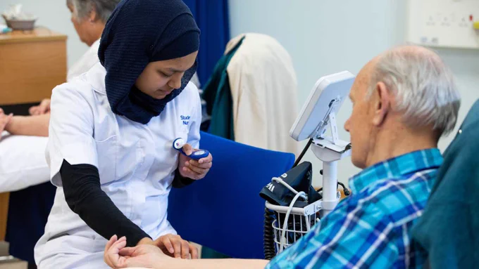 A student nurse in training 