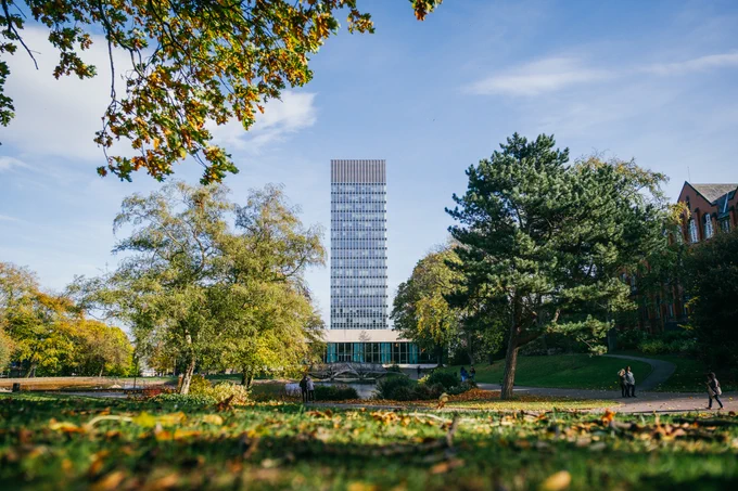 A view of the University's Arts Tower from the leafy Weston Park