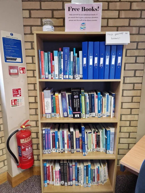 Books lined up on shelves.