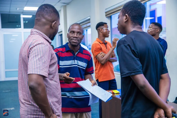 Audience newtorking during the AI-Integration Workshop by Kevin Fomengia at the Ghana AI Workshops organised by Bridgelabs
