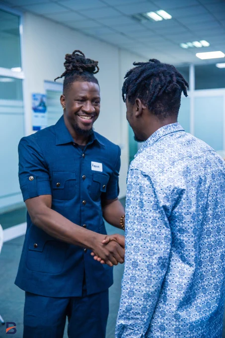 Kevin and Attendee exchanging a handshake during the AI-Integration Workshop by Kevin Fomengia at the Ghana AI Workshops organised by Bridgelabs