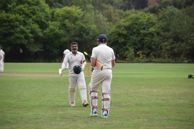 Kishan smiles after walking off