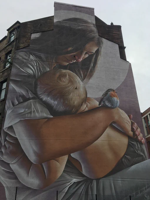 The St Enoch and child mural on George Street, part of the Glasgow City Centre Mural Trail.