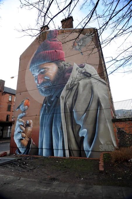 The St Mungo mural on High Street, part of the Glasgow City Centre Mural Trail.