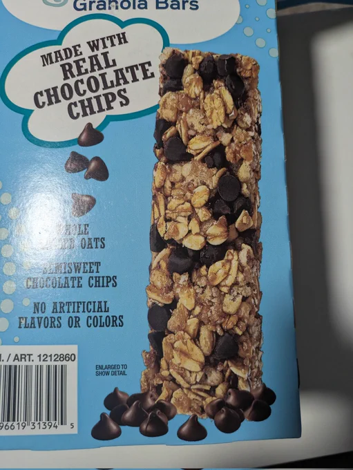 A photo of a box of Kirkland Signature granola bars. I swear the granola bar is wearing a bikini.