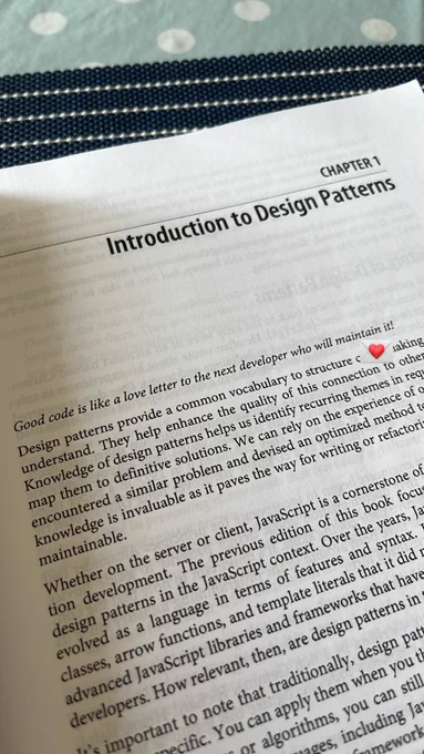 A picture of the first page of a book with the title "Chapter 1: Introduction to Design Patterns". The first line of the text says "Good code is like a love letter to the next developer who will maintain it"