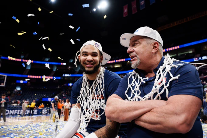 Johni Broome and Bruce Pearl after their 2024 SECT Championship win