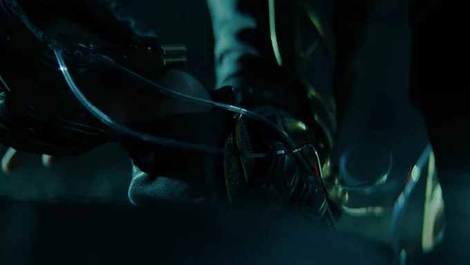 Lee Pace as Brother Day transferring his nanites to the First Claviger’s body.