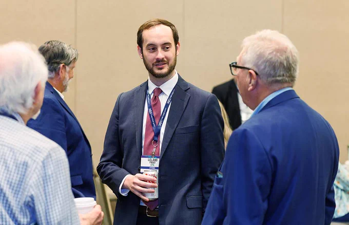 Leland engaging with attendees 