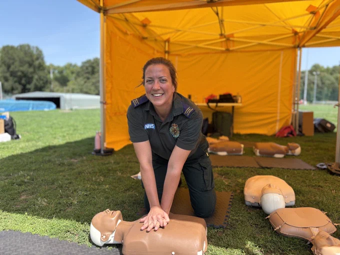 A London Ambulance Service CPR trainer at the event. 