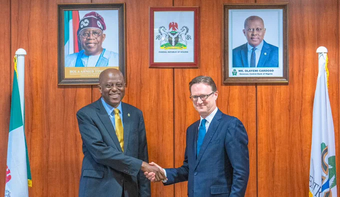 CBN Governor Olayemi Cardoso (Left), in a handshake with the British High Commissioner to Nigeria, Dr. Richard Montgomery (Right), during a strategic meeting at the CBN Head Office, Abuja.