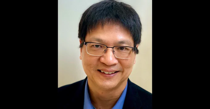 Portrait of Dr. Chunyu Wang smiling at the camera.