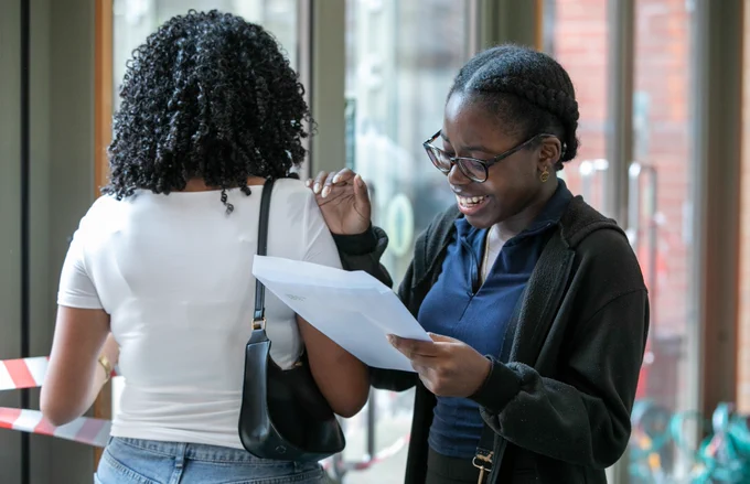 Two Cardinal Pole Catholic School students are excited with their results