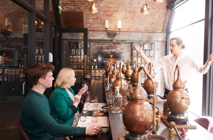 Two people on a whisky distillery and tasting session tour. 
Marketing Manchester