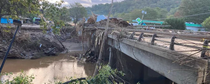 Photo taken on September 29, 2024, two days after Hurricane Helene; the image shows the receding Swannanoa River along Highway 70 in Asheville, North Carolina. Credit: Deborah J. Misch, former Graphics team member for the BAMS State of the Climate.
