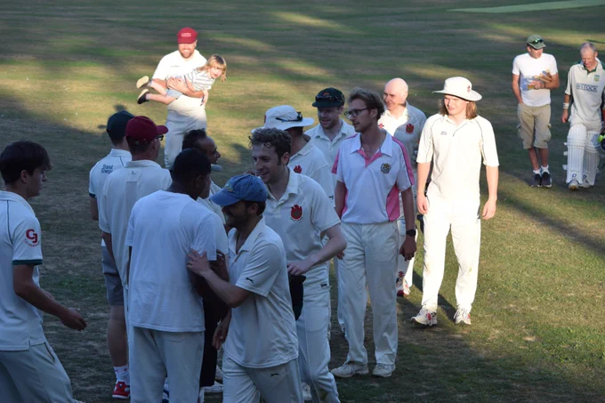 Teams shake hands after game