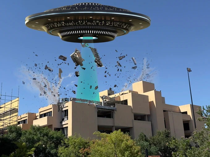 Photoshopped image of a UFO with pieces of the humanities building in its tractor beam.