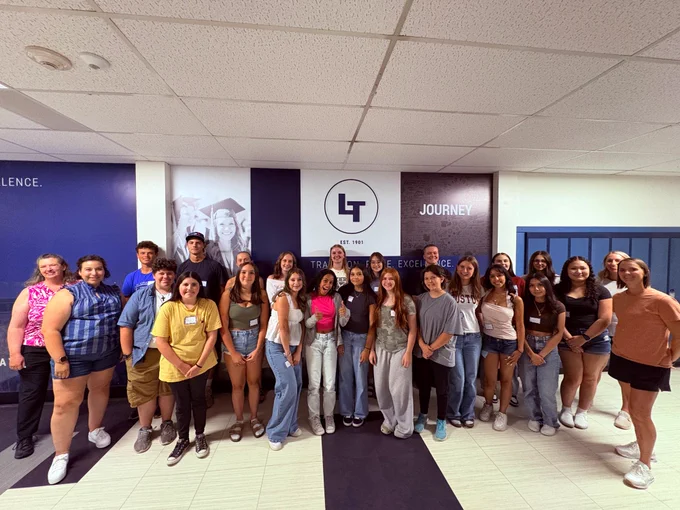 Group of high school students and their teacher