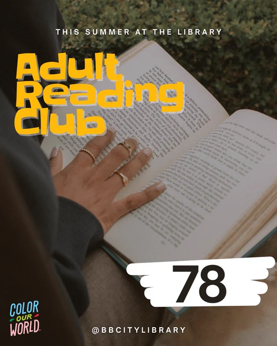 Close-up of a person’s hand holding open a book, wearing gold rings. Large yellow text reads “Adult Reading Club” with a number “78” below. Boynton Beach City Library logo and “Color Our World” branding included.