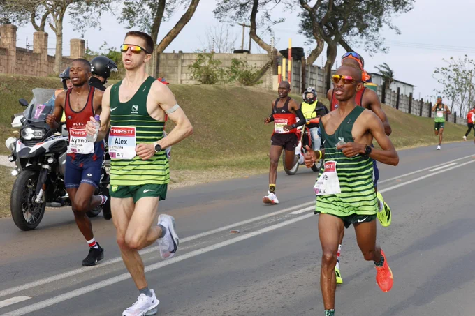 Alex Milne, Centre, during this years Comrades Marathon.
