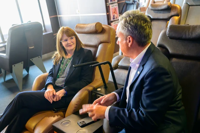 The Minister is pictured in conversation with Paul Grant on Stena Line's Superfast VII.  They are pictured in the Lounge of the vessel.