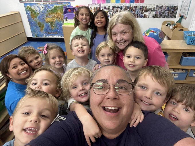 Riverside teachers with students.