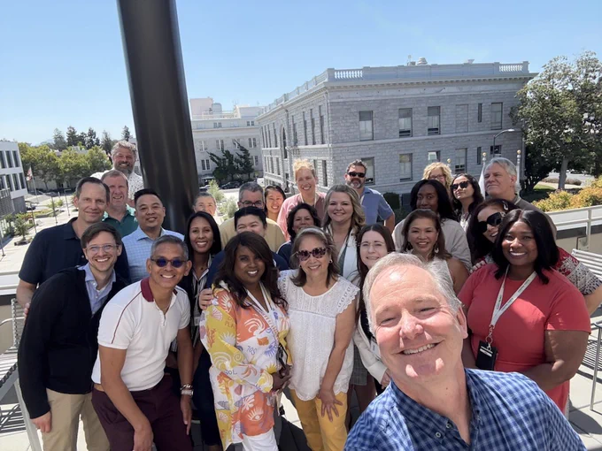 Contra Costa County Counsel employees pose for a selfie in the County Administration Building in Martinez, California.