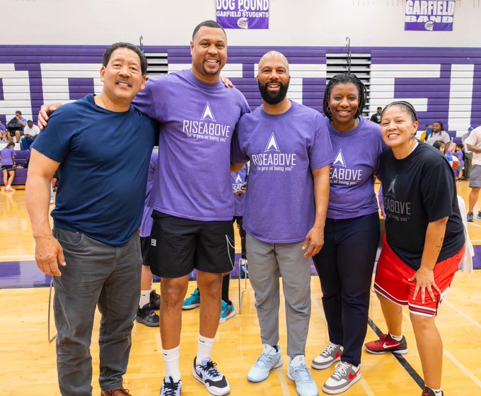 Group photo with Mayor Harrell at the Rise Above basketball clinic 