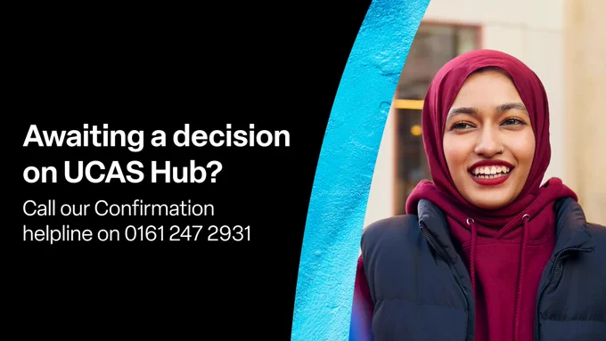 A student wearing a hoodie is smiling. The text says "Awaiting a decision on UCAS Hub? Call our Confirmation helpline on 0161 247 2931"