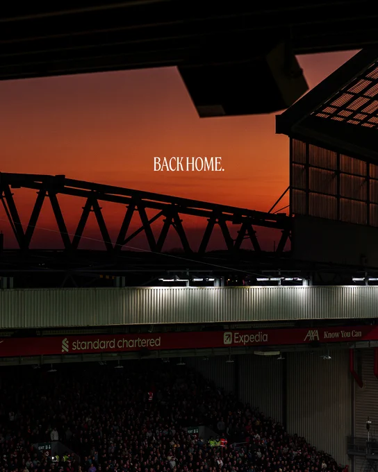 Photography of Anfield on an evening, with text reading: Back home.